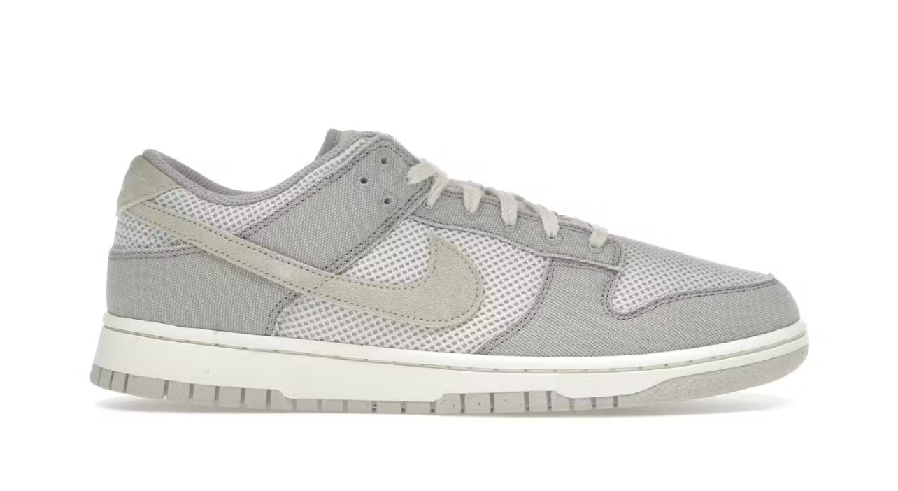 Nike Dunk Low Retro SE
College Grey Light Bone Pale Ivory Pearl White
