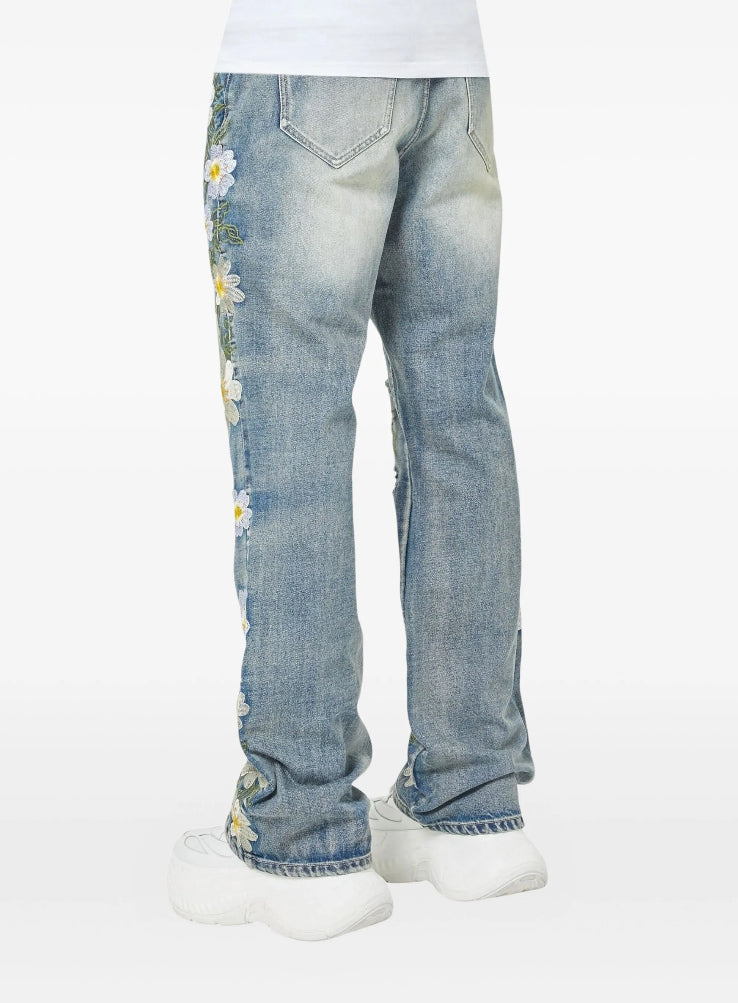 GUAPI
Floral-embroidered distressed jeans