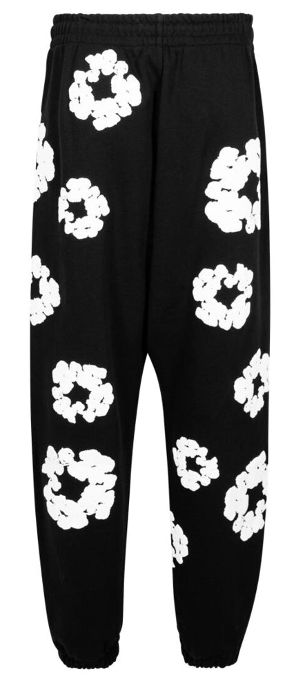 Denim Tears
Cotton Wreath-print track pants