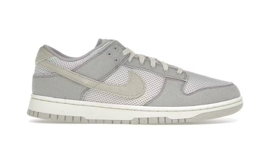 Nike Dunk Low Retro SE
College Grey Light Bone Pale Ivory Pearl White